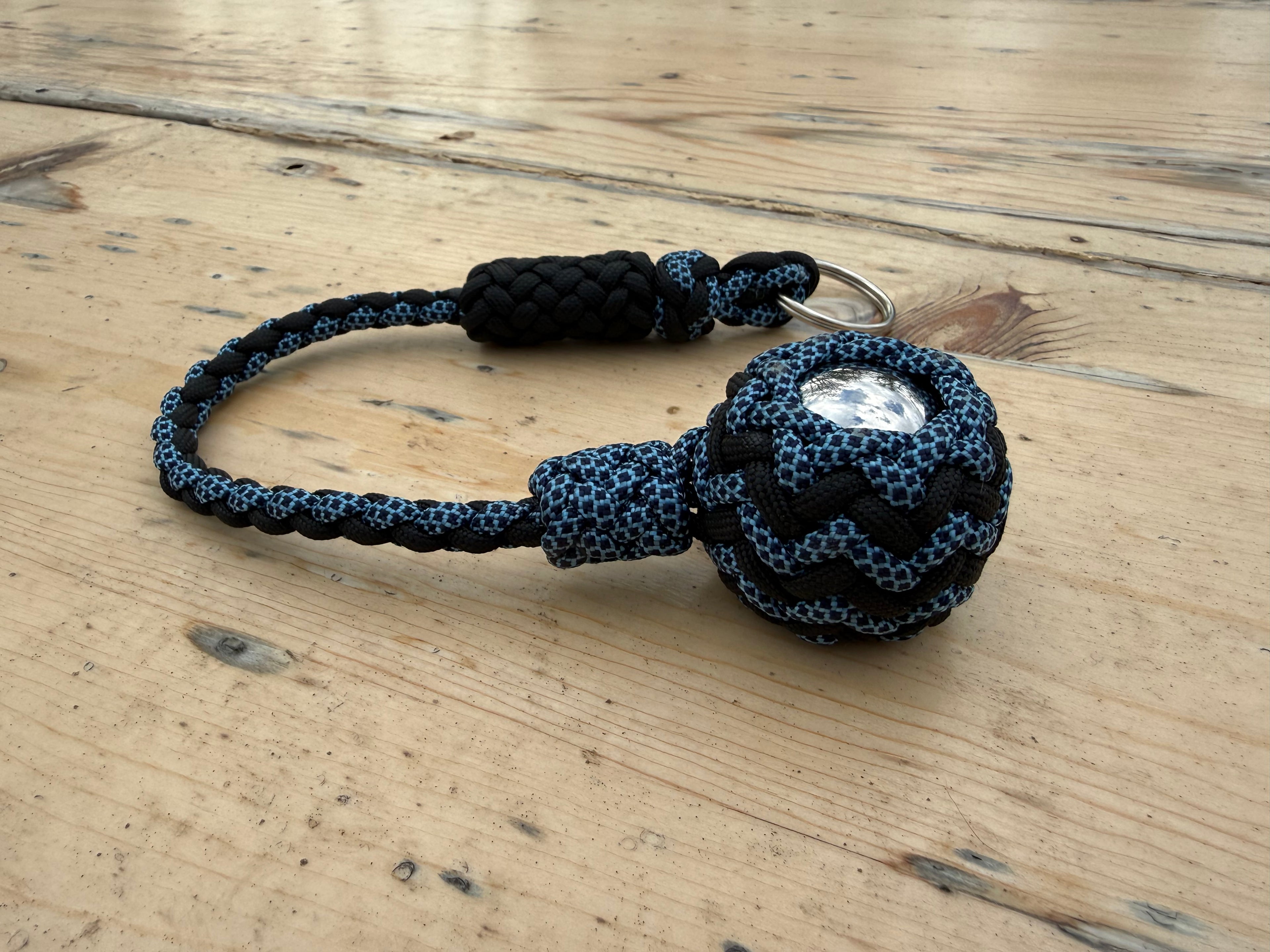 Decorative Paracord Wrapped 1.5 inch Steel Ball in Black and Blue with Black Diamonds Keychain monkey fist style on a split ring