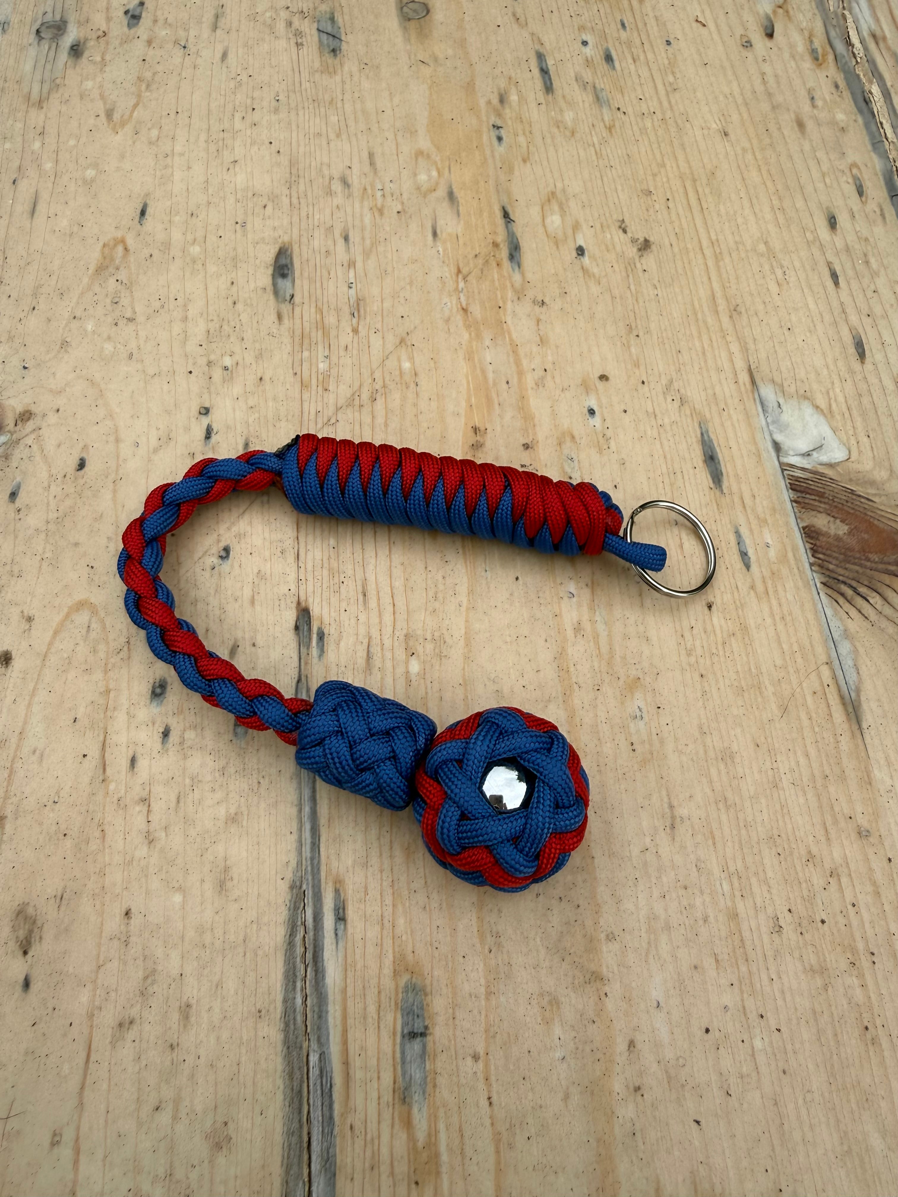 Decorative Paracord Wrapped 1 inch Steel Ball in Blue and Red Keychain monkey fist style on a split ring