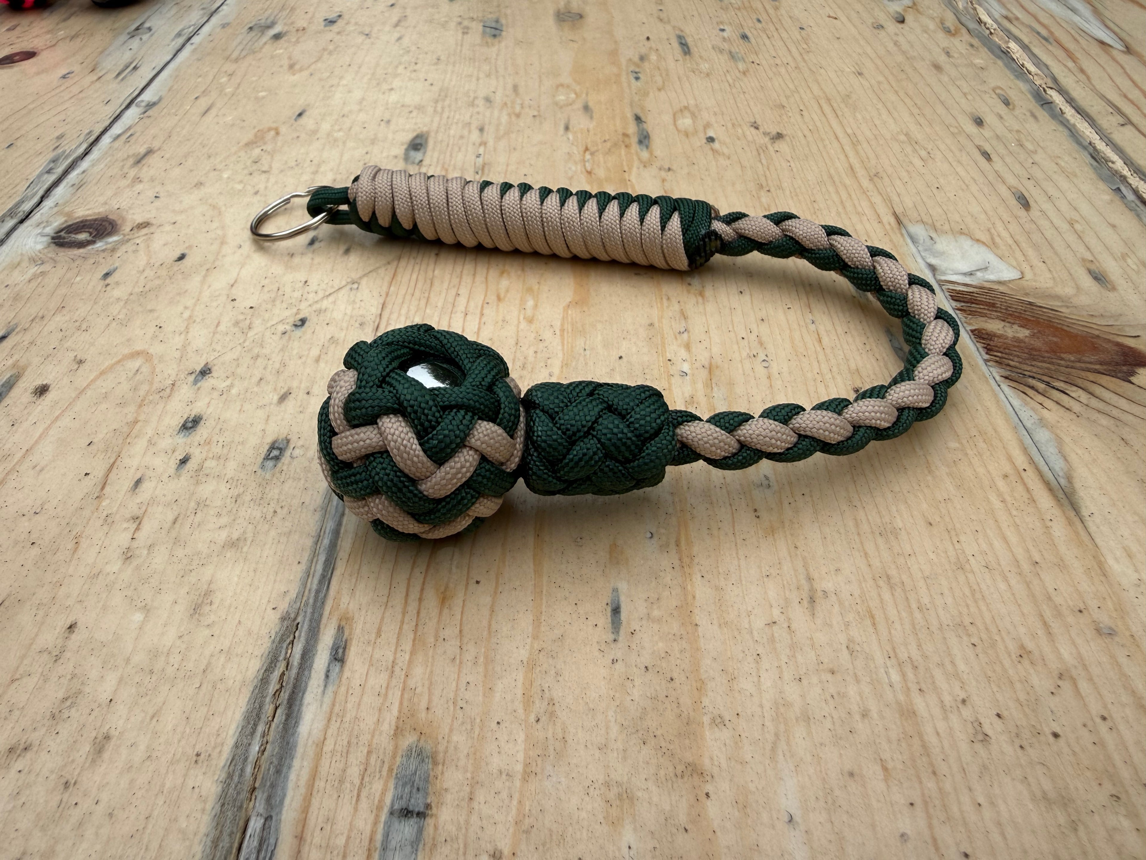 Decorative Paracord Wrapped 1 inch Steel Ball in Green and Tan Keychain monkey fist style on a split ring