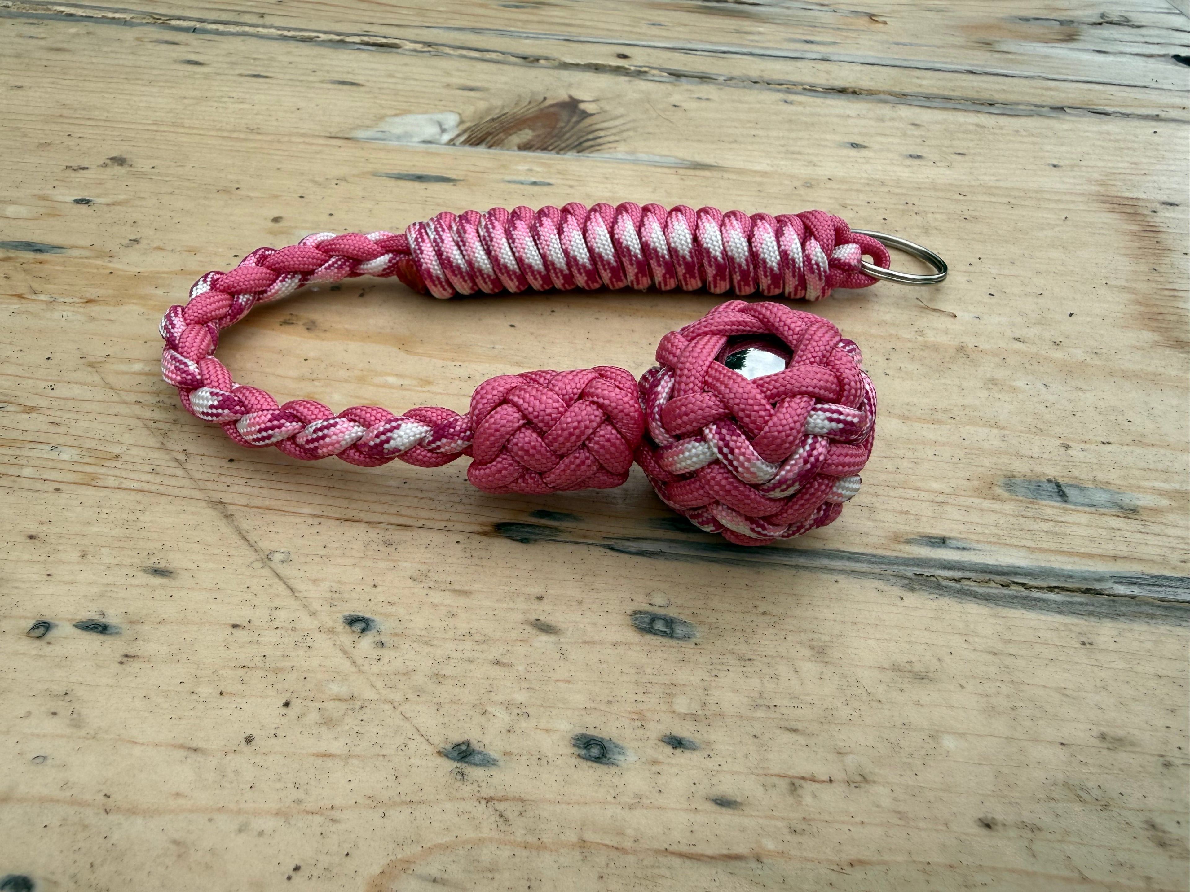 Decorative Paracord Wrapped 1 inch Steel Ball in Rose Pink and Pink Camo Keychain monkey fist style on a split ring