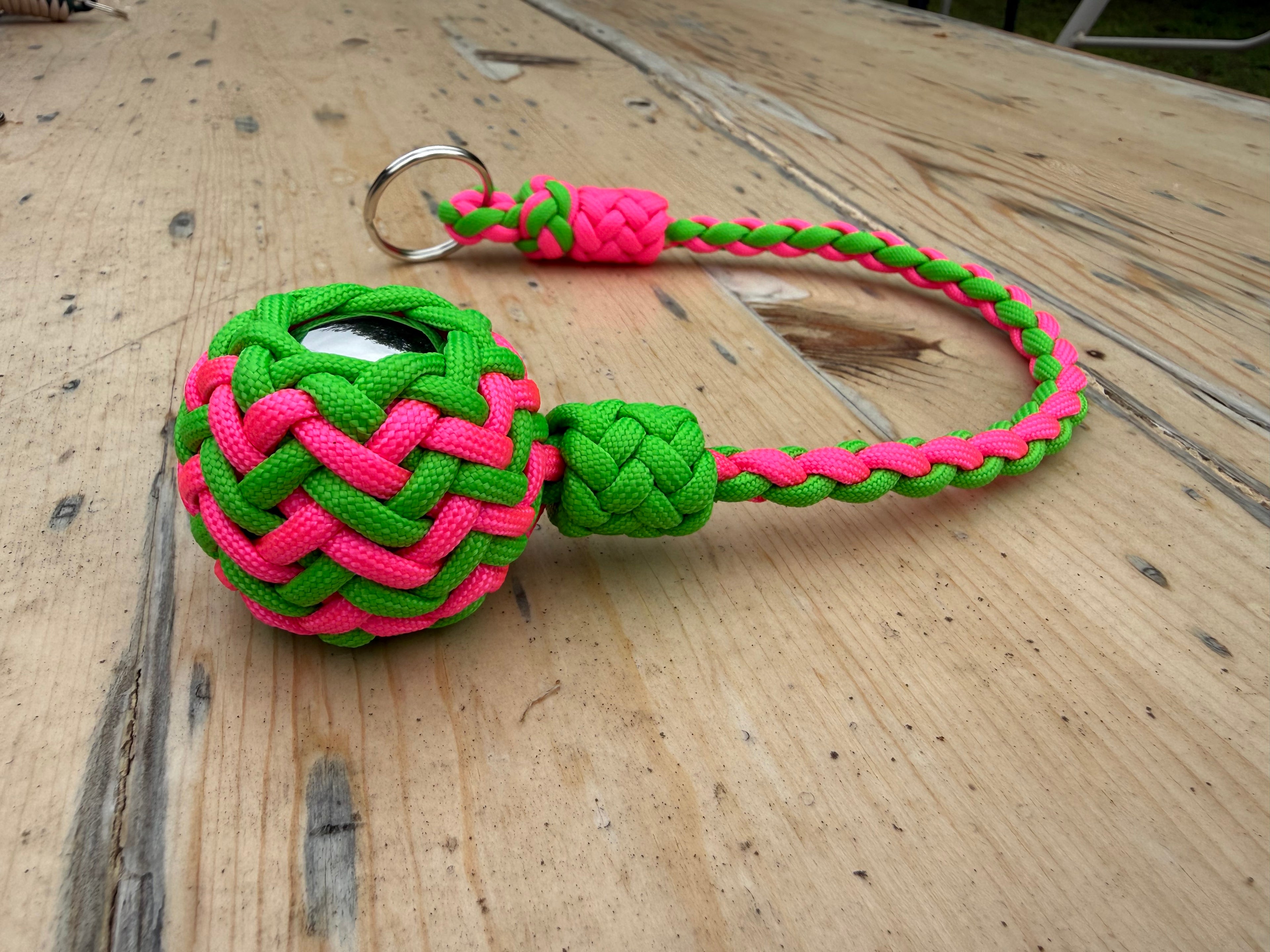 Decorative Paracord Wrapped 1.5 inch Steel Ball in Hot Pink and Neon Green monkey fist style on a split ring