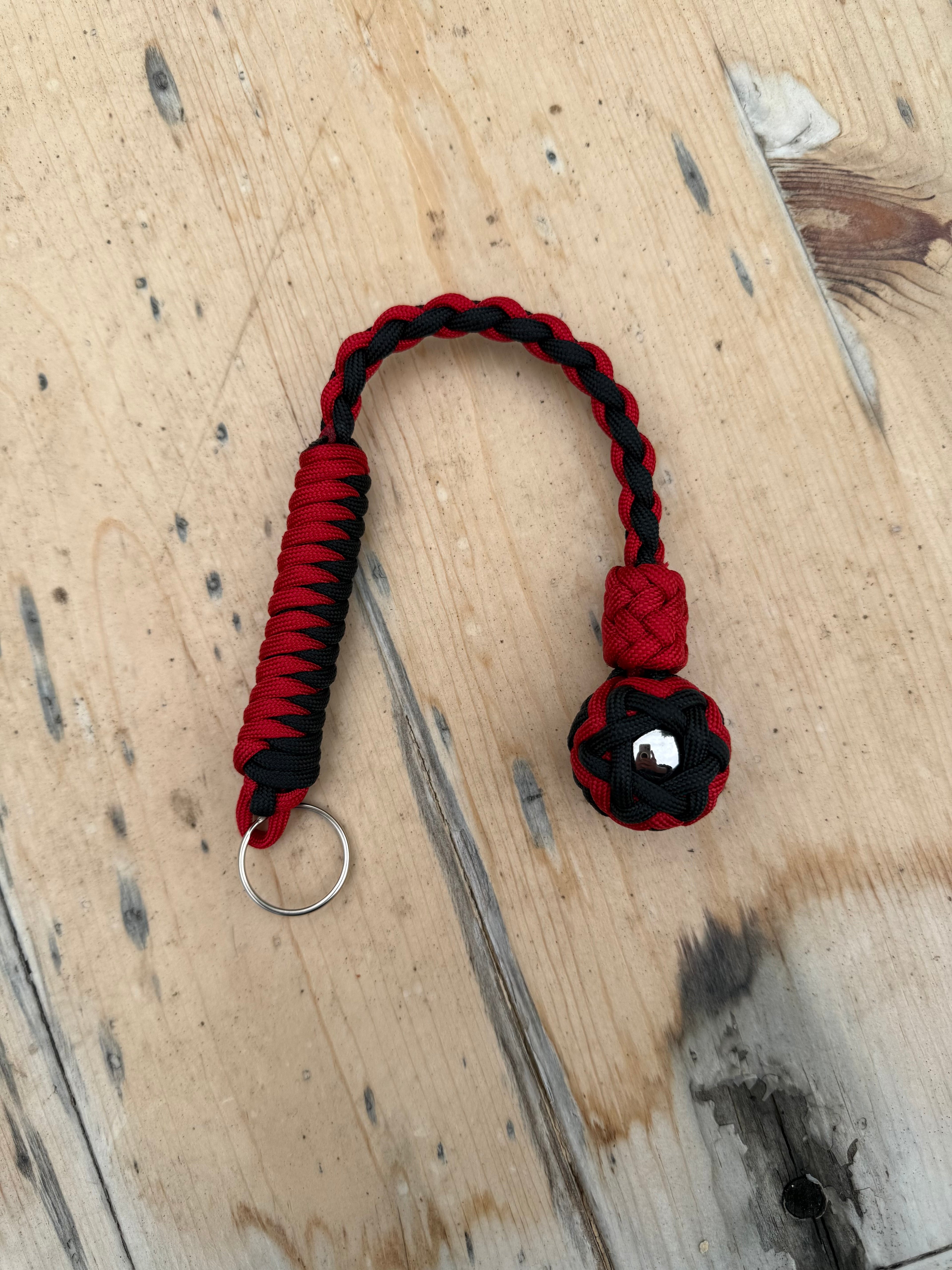 Decorative Paracord Wrapped 1 inch Steel Ball in Black and Red Keychain monkey fist style on a split ring