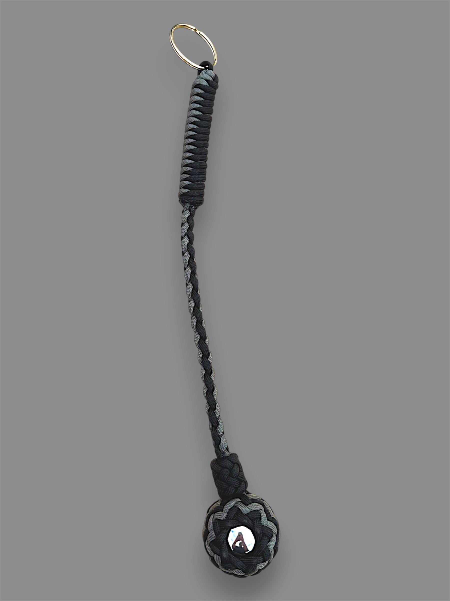 Decorative Paracord Wrapped 1.5 inch Steel Ball in Black and Charcoal Gray Keychain monkey fist style on a split ring
