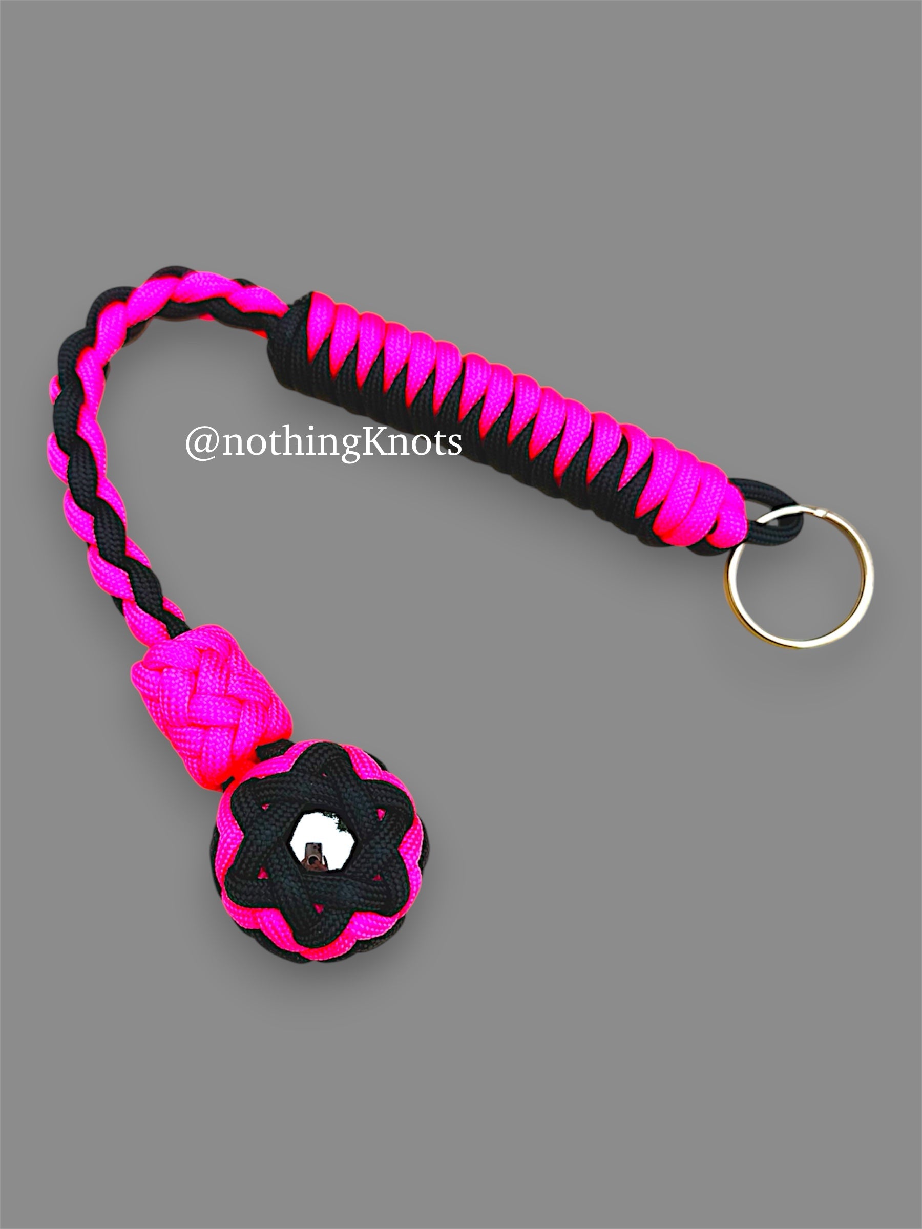 Decorative Paracord Wrapped 1 inch Steel Ball in Black and Neon Pink Keychain monkey fist style on a split ring
